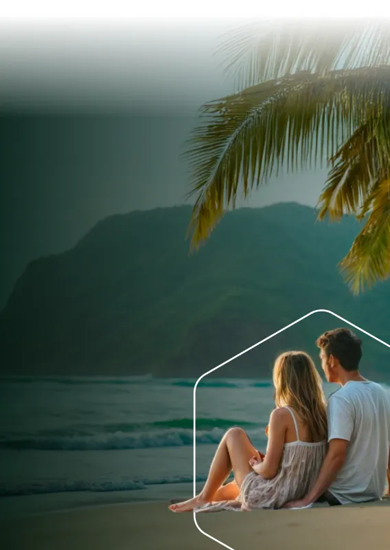 Couple sitting on the beach enjoying a peaceful moment by the sea.